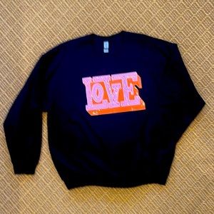 Women’s boutique sweatshirt with “LOVE” sequined graphic